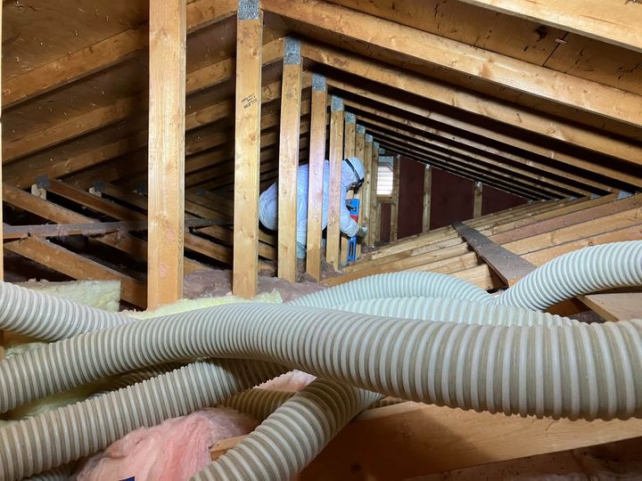 Blower hoses running across the attic