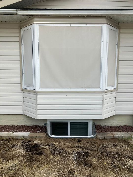 Finished egress window and well below the bay window in Prince George