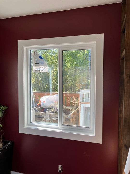New window on a red accent wall