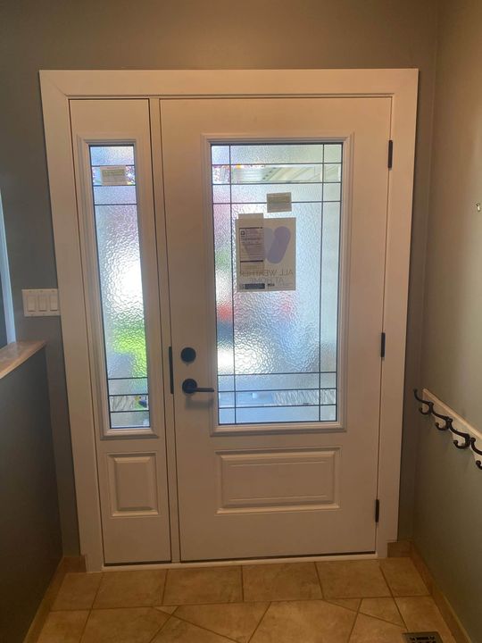 New entry door and sidelite from the hallway