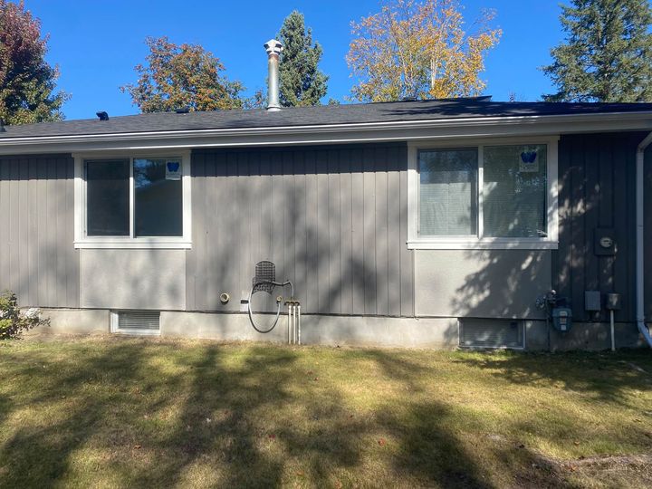 Grey bungalow with all five new windows finished