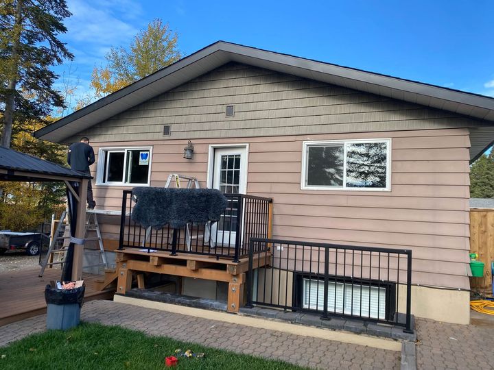 Back of the bungalow with new windows above the deck